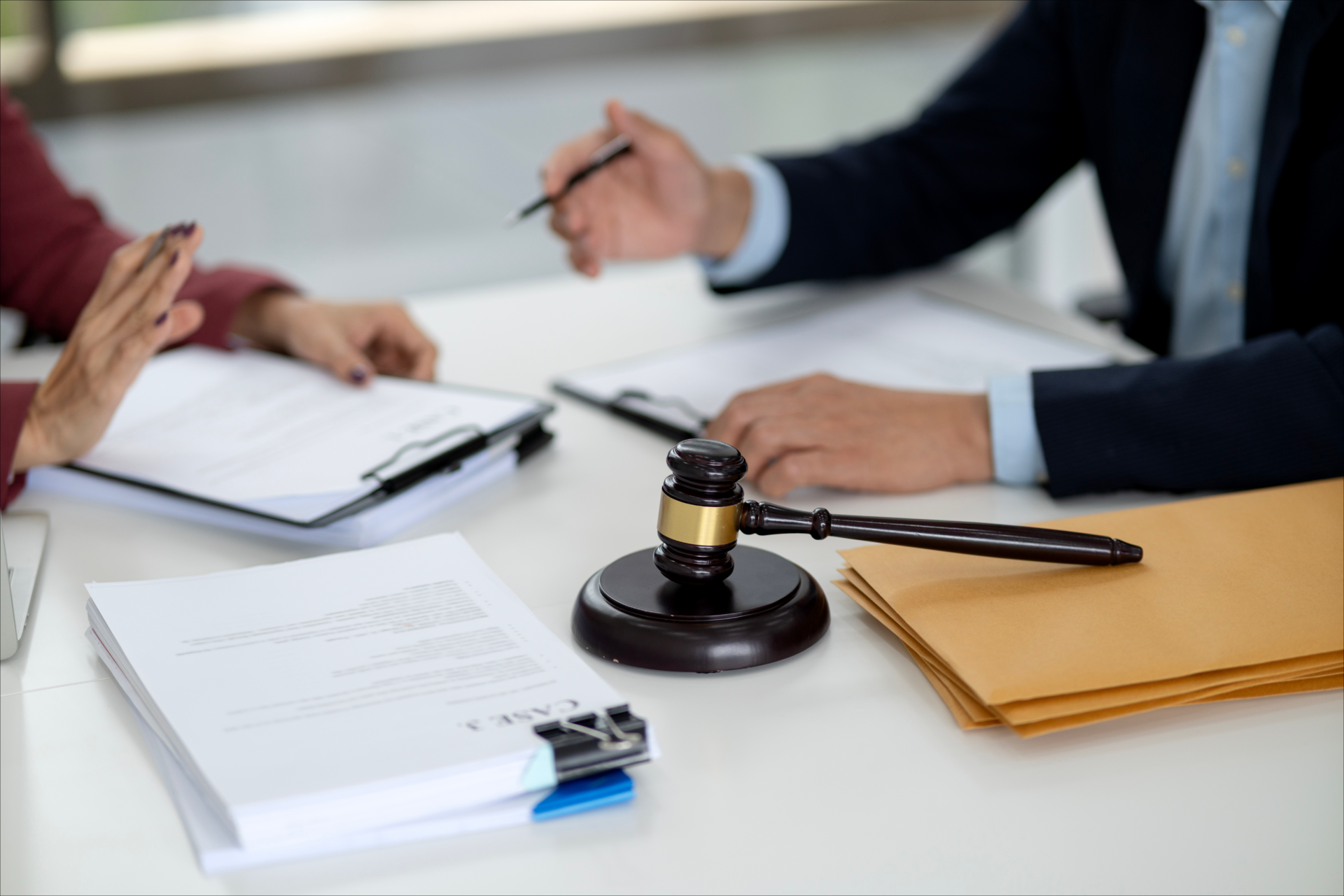 Legal meeting with contract and gavel